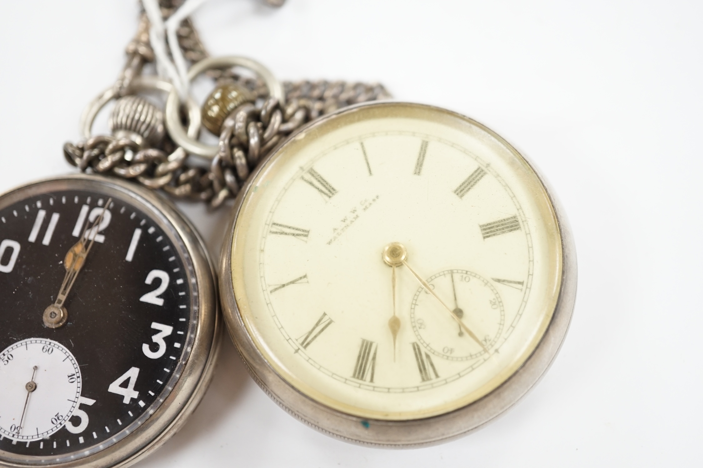 A silver open faced black dial pocket watch with a silver albert, together with a silver Waltham open face pocket watch, with Roman dial. Condition - poor to fair